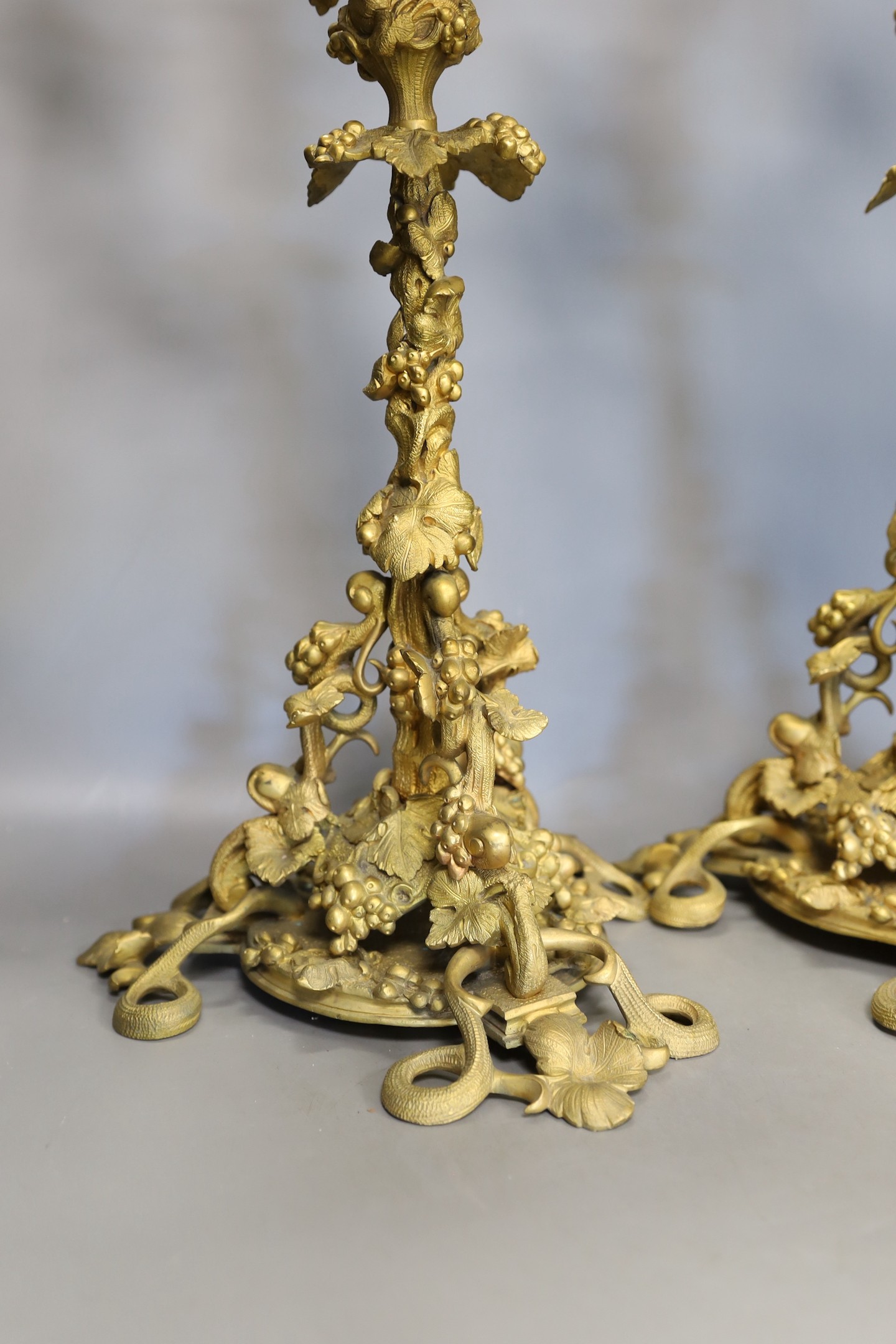 A pair of Victorian ormolu 4-light candelabra with vineous stems - 56cm tall